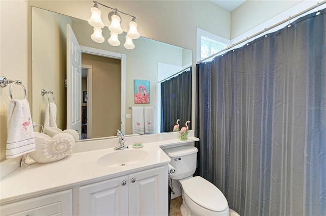 13167 Fernando St, Venice, FL 34293 - bathroom with vanity, toilet, and a shower with shower curtain