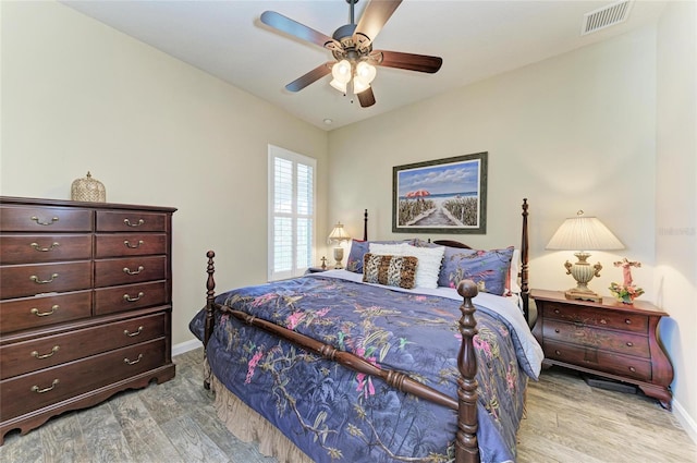13167 Fernando St, Venice, FL 34293 - bedroom with baseboards, wood finished floors, and ceiling fan