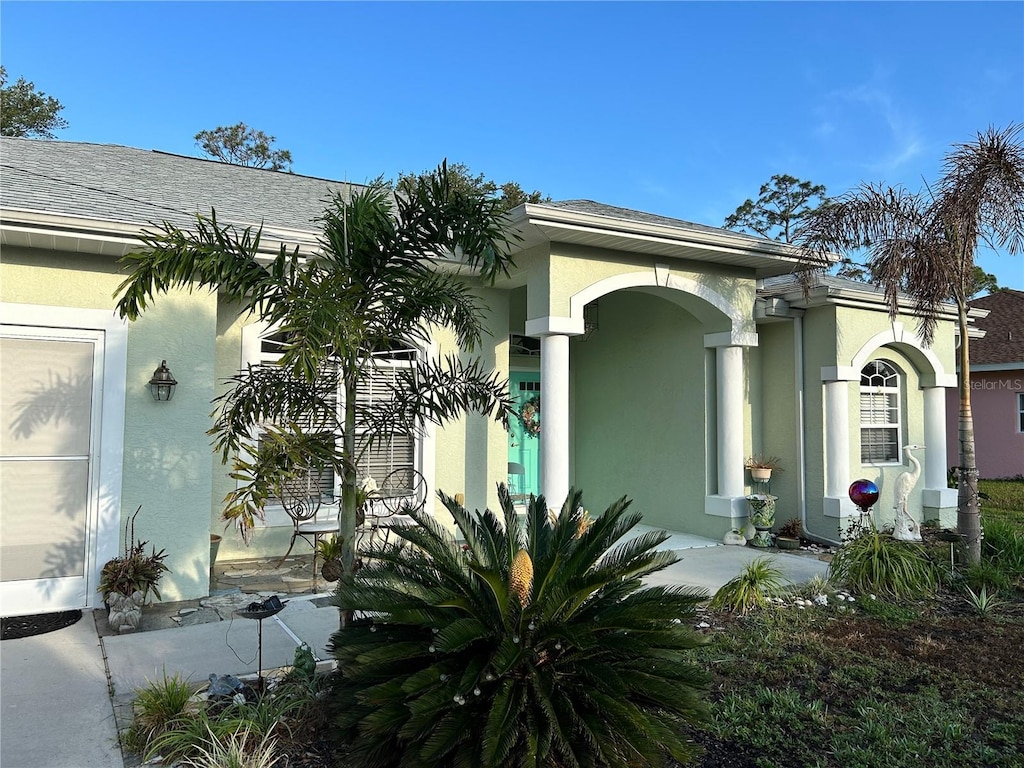 exterior space featuring stucco siding