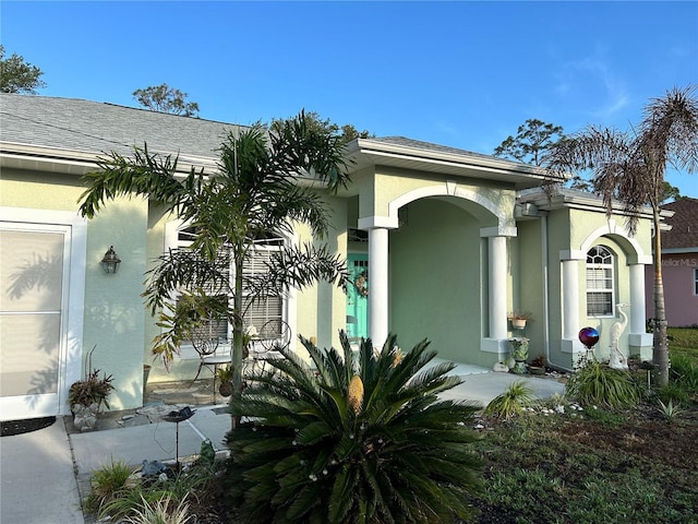 exterior space featuring stucco siding