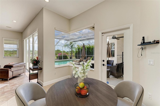 8103 Snowy Egret Pl, Bradenton, FL 34202 - dining room featuring a sunroom, baseboards, a ceiling fan, and recessed lighting
