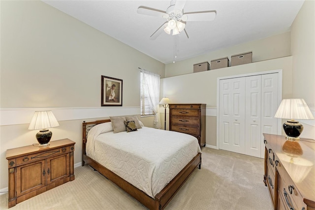 8103 Snowy Egret Pl, Bradenton, FL 34202 - bedroom featuring light carpet, a closet, baseboards, and ceiling fan