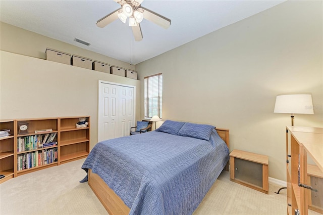 8103 Snowy Egret Pl, Bradenton, FL 34202 - carpeted bedroom featuring a closet, a ceiling fan, and baseboards