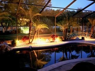 6567 Eagle Ridge Way, Lakeland, FL 33813 - swimming pool with a lanai