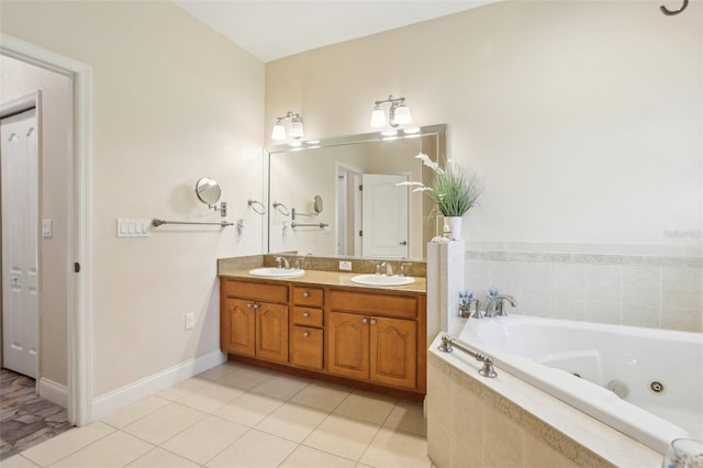 full bath with tile patterned floors, double vanity, a sink, and a whirlpool tub