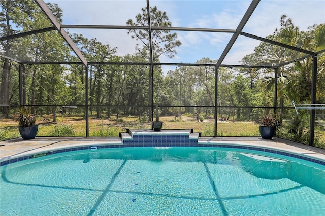 outdoor pool featuring a lanai