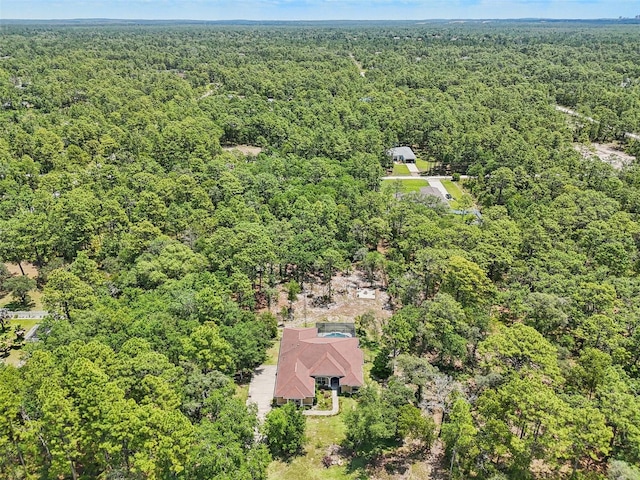bird's eye view featuring a view of trees