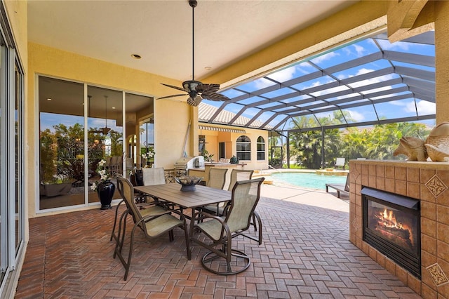 6143 9th Avenue Cir NE, Bradenton, FL 34212 - view of patio featuring an outdoor pool, glass enclosure, outdoor dining area, and grilling area