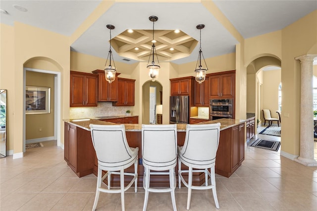 6143 9th Avenue Cir NE, Bradenton, FL 34212 - kitchen featuring appliances with stainless steel finishes, arched walkways, coffered ceiling, backsplash, and light tile patterned floors