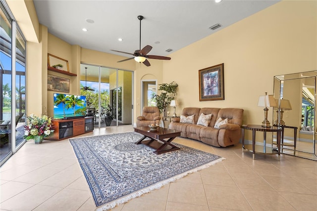 6143 9th Avenue Cir NE, Bradenton, FL 34212 - tiled living area featuring recessed lighting, a ceiling fan, and a towering ceiling