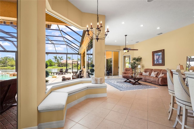 6143 9th Avenue Cir NE, Bradenton, FL 34212 - living area featuring recessed lighting, a sunroom, ceiling fan, light tile patterned flooring, and a chandelier