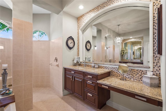 6143 9th Avenue Cir NE, Bradenton, FL 34212 - full bathroom featuring a walk in shower, vanity, tasteful backsplash, and tile patterned flooring