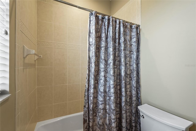 6143 9th Avenue Cir NE, Bradenton, FL 34212 - bathroom with shower / bath combo with shower curtain and toilet