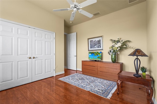 6143 9th Avenue Cir NE, Bradenton, FL 34212 - bedroom featuring wood finished floors, baseboards, a closet, and ceiling fan