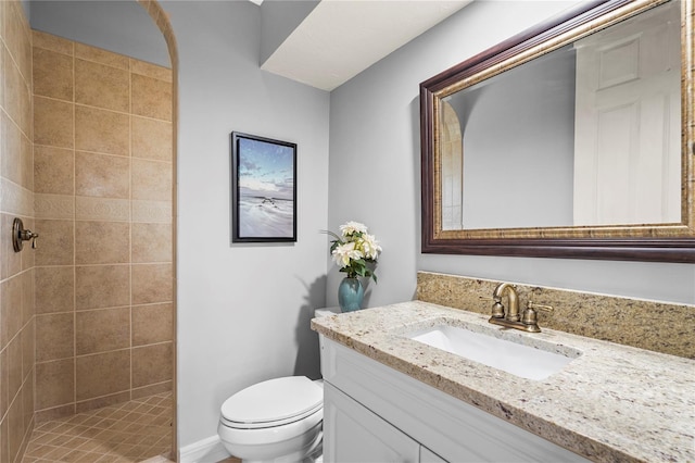 6143 9th Avenue Cir NE, Bradenton, FL 34212 - bathroom with vanity, toilet, and tiled shower