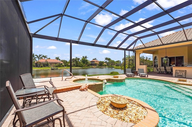 6143 9th Avenue Cir NE, Bradenton, FL 34212 - view of swimming pool featuring a patio area, a water view, a pool with connected hot tub, and a lanai