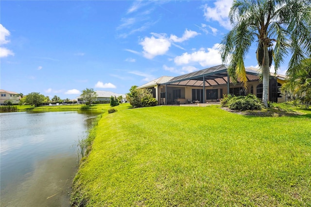 6143 9th Avenue Cir NE, Bradenton, FL 34212 - view of green lawn with a water view and a lanai