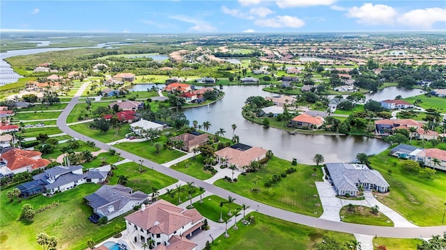 6143 9th Avenue Cir NE, Bradenton, FL 34212 - aerial view of property and surrounding area with nearby suburban area and a large body of water