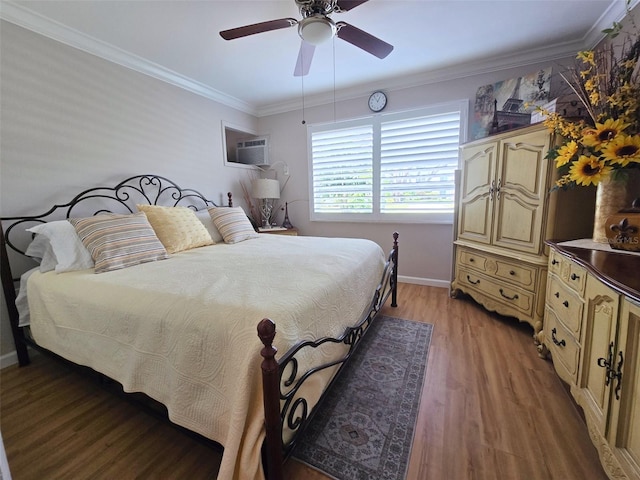 bedroom with a ceiling fan, a wall mounted air conditioner, baseboards, crown molding, and light wood-type flooring