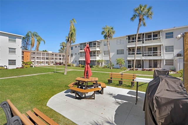 view of home's community featuring a yard