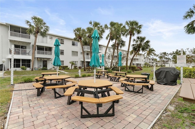 surrounding community featuring a lawn