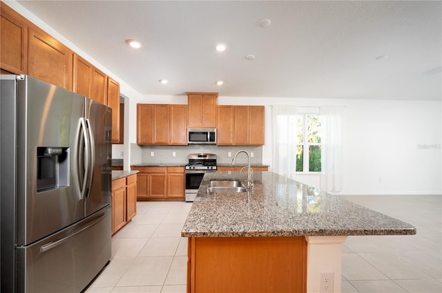 10171 Milky Way Cir, Sarasota, FL 34241 - kitchen featuring a sink, light stone counters, recessed lighting, light tile patterned floors, and appliances with stainless steel finishes
