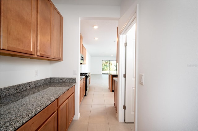10171 Milky Way Cir, Sarasota, FL 34241 - hall with recessed lighting and light tile patterned flooring