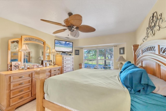 9366 Westminster Ave, Englewood, FL 34224 - bedroom featuring ceiling fan and light tile patterned floors