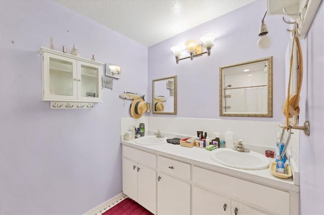 9366 Westminster Ave, Englewood, FL 34224 - full bathroom featuring double vanity and a shower with curtain