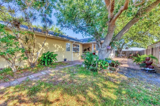 9366 Westminster Ave, Englewood, FL 34224 - fenced backyard with a patio
