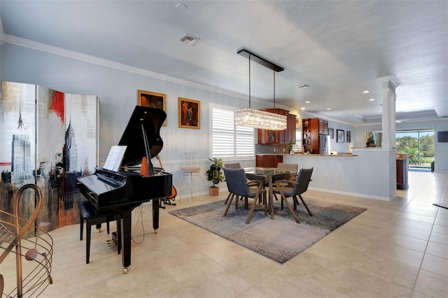 212 River Enclave Ct, Bradenton, FL 34212 - dining area with crown molding, decorative columns, and light tile patterned floors