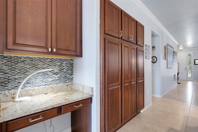 212 River Enclave Ct, Bradenton, FL 34212 - hall featuring light tile patterned floors, ornamental molding, and baseboards