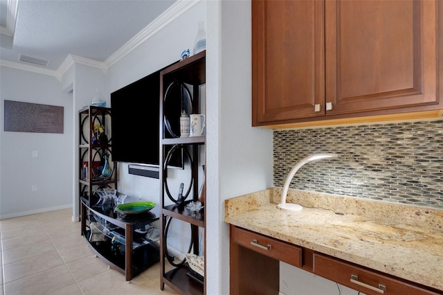 212 River Enclave Ct, Bradenton, FL 34212 - laundry area featuring ornamental molding, light tile patterned flooring, and baseboards