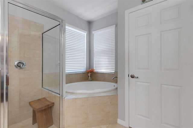 212 River Enclave Ct, Bradenton, FL 34212 - full bath with a garden tub, a stall shower, and tile patterned floors