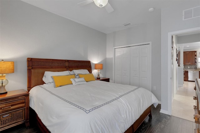 212 River Enclave Ct, Bradenton, FL 34212 - bedroom featuring a closet, wood finished floors, a ceiling fan, and baseboards