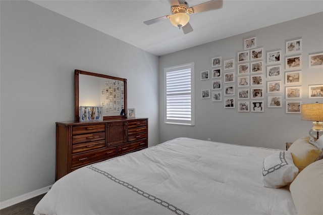 212 River Enclave Ct, Bradenton, FL 34212 - bedroom with baseboards, a ceiling fan, and dark wood-style floors