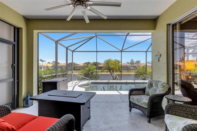 212 River Enclave Ct, Bradenton, FL 34212 - view of patio / terrace with a ceiling fan, a water view, an outdoor pool, and glass enclosure