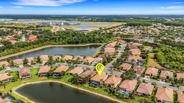 212 River Enclave Ct, Bradenton, FL 34212 - aerial view of property and surrounding area with nearby suburban area and a nearby body of water