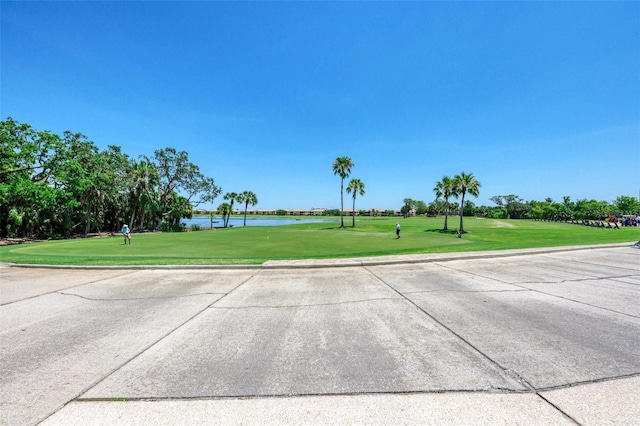 212 River Enclave Ct, Bradenton, FL 34212 - view of street with a water view, curbs, and view of golf course