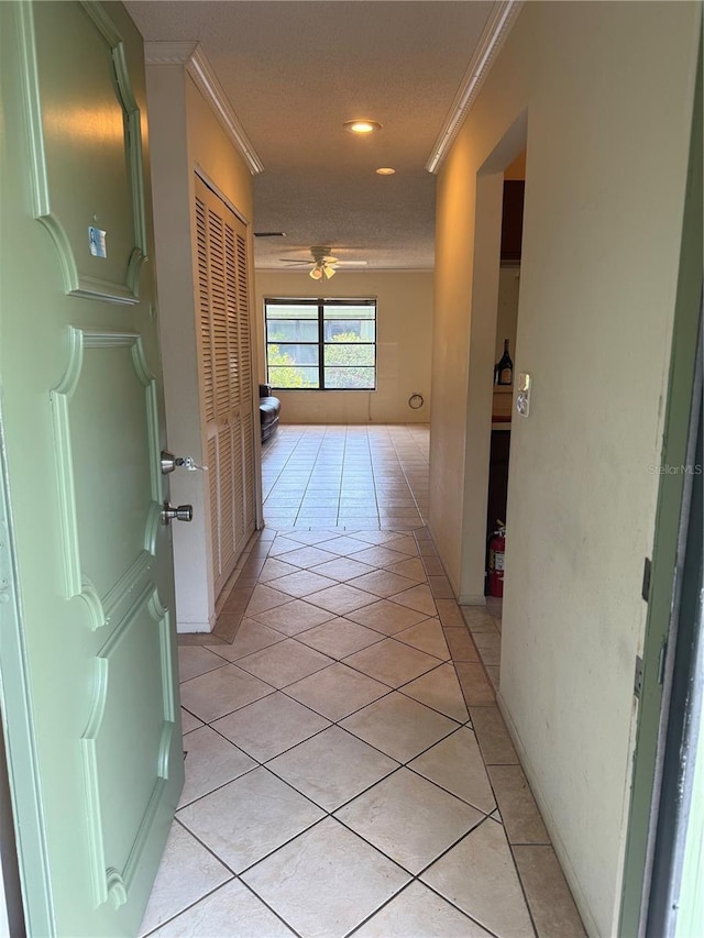 5014 Barrington Cir Unit 2102, Sarasota, FL 34234 - hall featuring ornamental molding, light tile patterned flooring, and recessed lighting