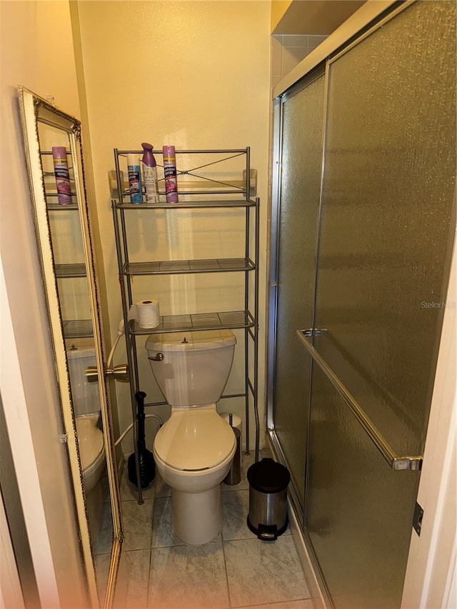 5014 Barrington Cir Unit 2102, Sarasota, FL 34234 - full bath featuring toilet, a shower stall, and tile patterned floors