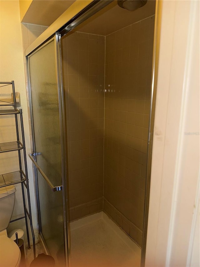 5014 Barrington Cir Unit 2102, Sarasota, FL 34234 - bathroom featuring toilet and a shower stall
