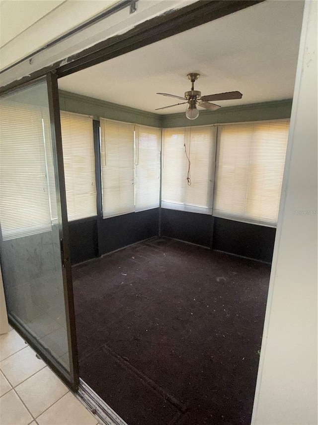 5014 Barrington Cir Unit 2102, Sarasota, FL 34234 - unfurnished sunroom with ceiling fan and plenty of natural light