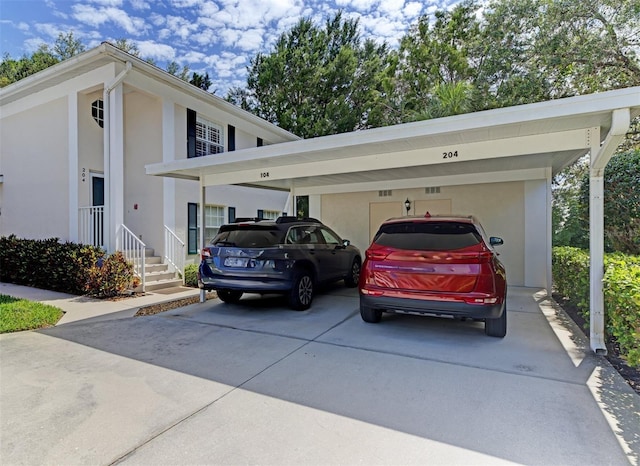 802 Montrose Dr Unit 204, Venice, FL 34293 - view of front facade featuring stucco siding