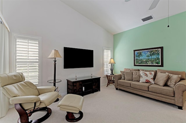 802 Montrose Dr Unit 204, Venice, FL 34293 - living area with carpet floors, ceiling fan, high vaulted ceiling, and baseboards