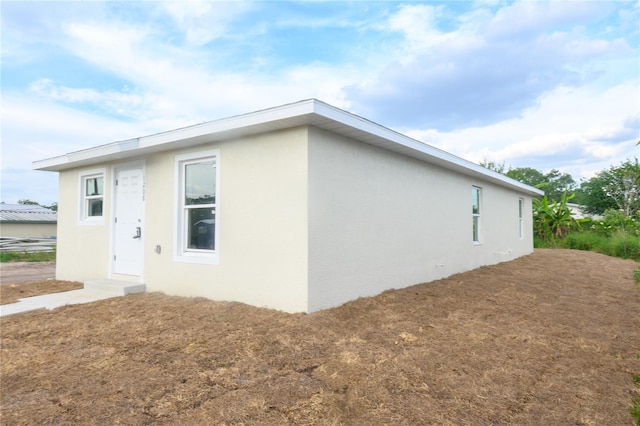 1208 SE Mills Ave, Arcadia, FL 34266 - view of property exterior with stucco siding