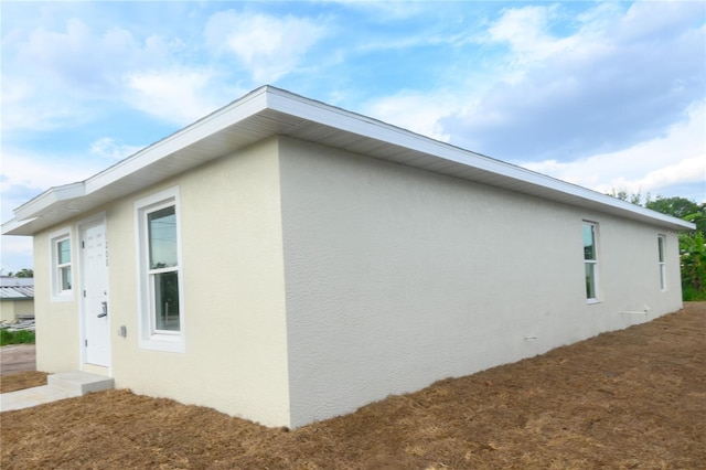 1208 SE Mills Ave, Arcadia, FL 34266 - view of home's exterior featuring stucco siding