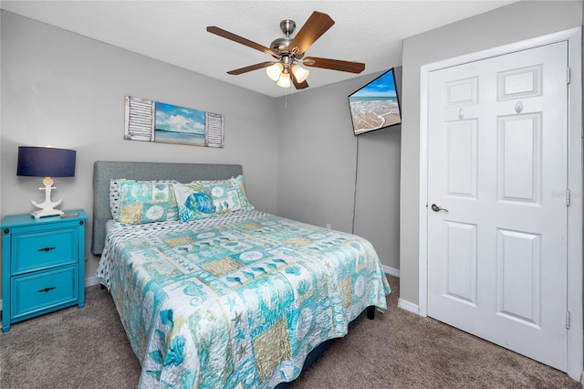 2726 Knoll St E, Palm Harbor, FL 34683 - carpeted bedroom with baseboards and ceiling fan