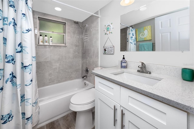 2726 Knoll St E, Palm Harbor, FL 34683 - full bath featuring vanity, shower / bathtub combination with curtain, and wood finished floors
