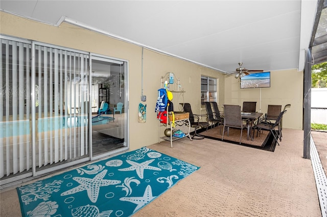 2726 Knoll St E, Palm Harbor, FL 34683 - view of patio / terrace featuring a ceiling fan and outdoor dining space